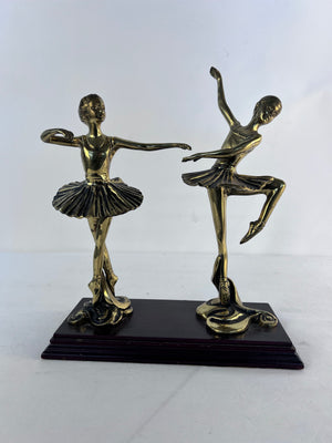 Elegance in Motion Ballerinas Brass Bronze Together on Rectangular Wood Base