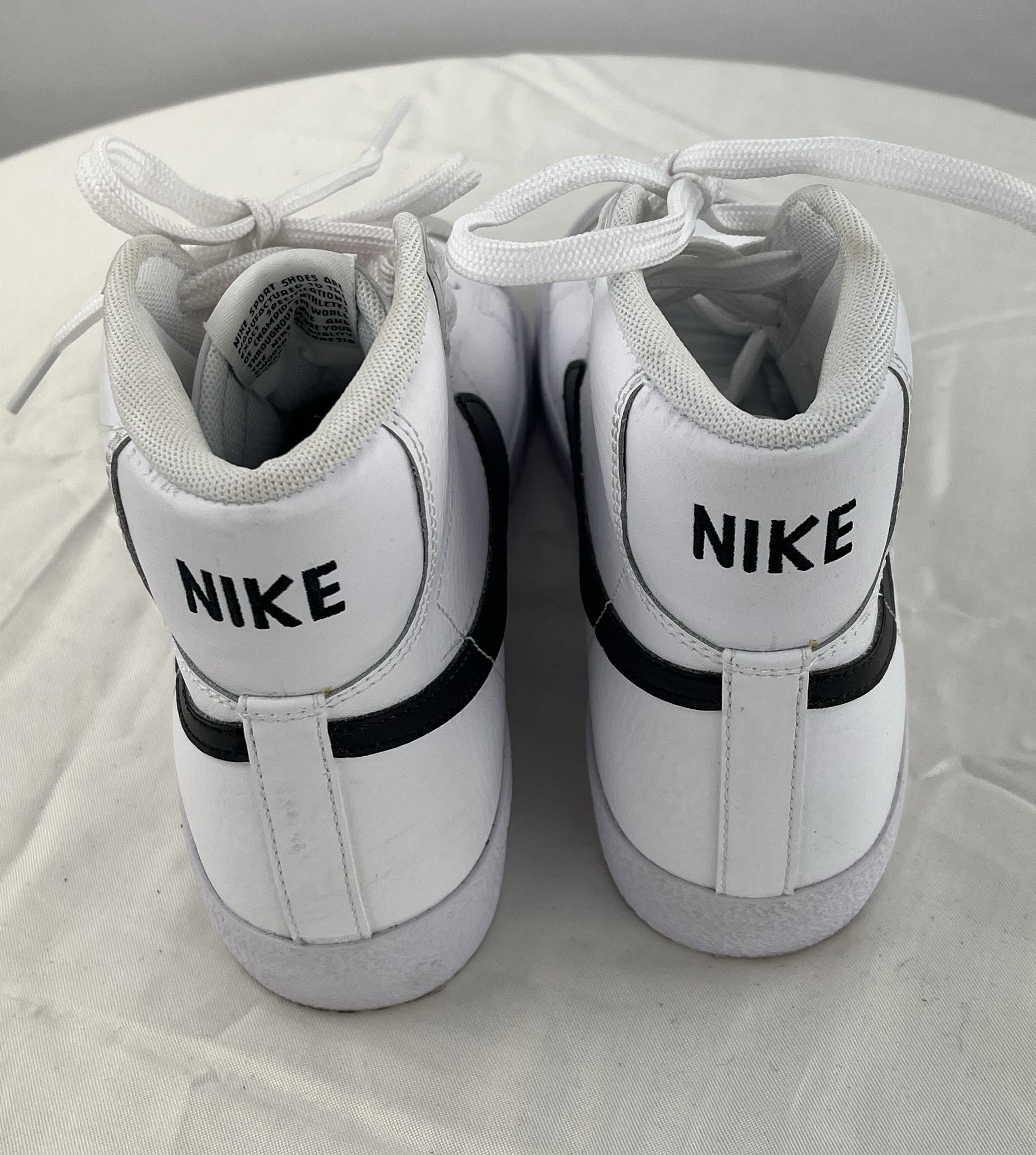 nike high tops all white
